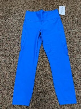 Athleta Bright Blue Interval Stash 7/8 Performance Leggings